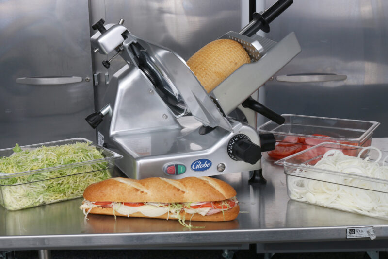 Globe G12 manual slicer with sub prepped veggies