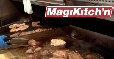 MagiKitchn griddle with various meats cooking