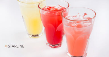 Three glasses of colorful drinks with the Starline logo