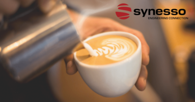 Synesso commercial espresso machine - latte drink being poured