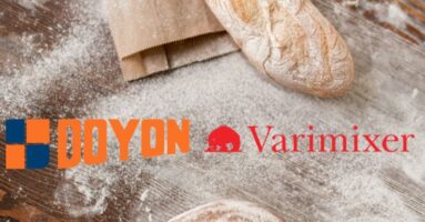 Bread on wood table with flour - best commercial baking equipment