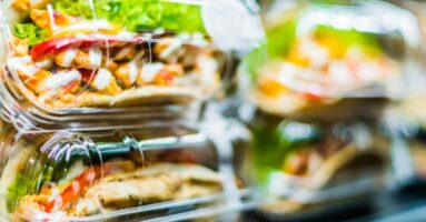 Packaged food in merchandiser for purchase