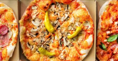 Pizzas in delivery boxes - CookTek pizza delivery systems